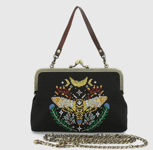 Kisslock skullhead moth vintage style purse