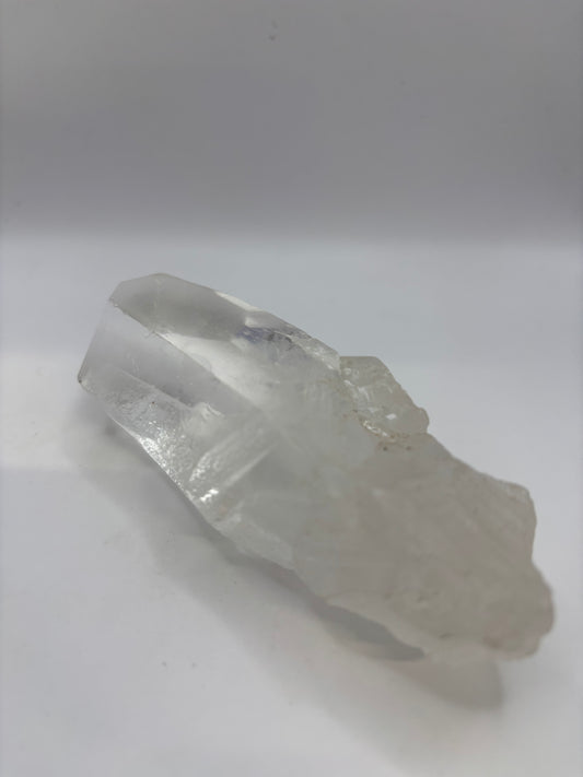 Crystal clear raw quartz point