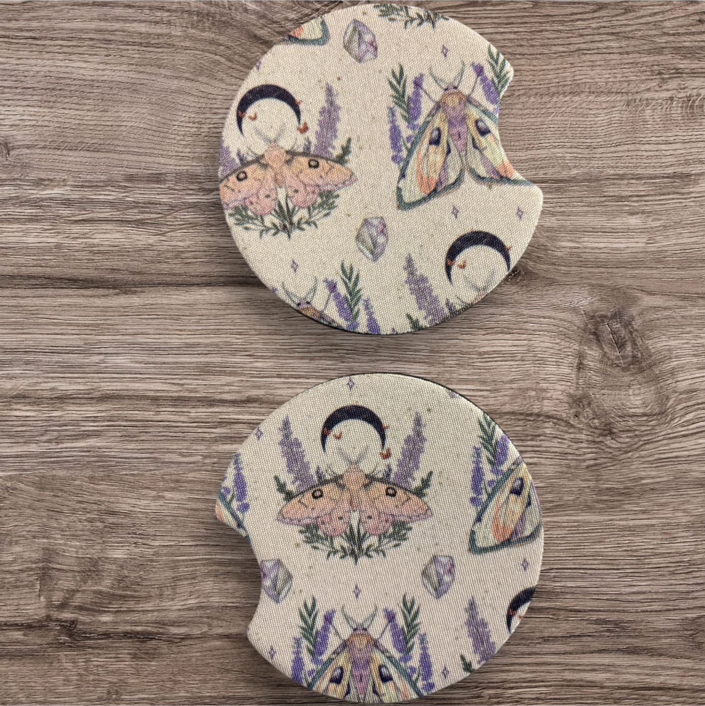 Moth and moon car coasters