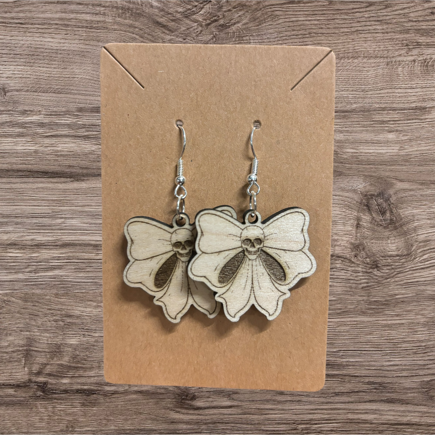 Skull bow wood earrings